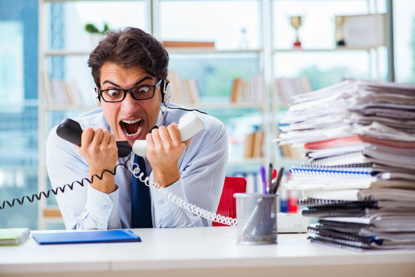Unhappy roofing call center worker Unhappy roofing call center worker